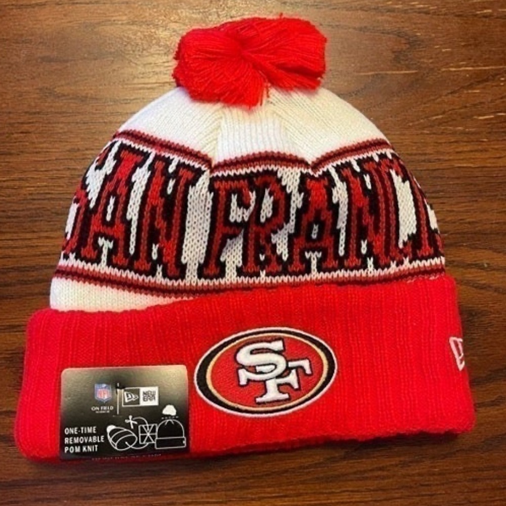 San Francisco 49ers New Era 2023 Sideline Historic Pom Cuffed Knit Hat Beanie